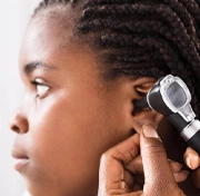 Girl having hearing assessment