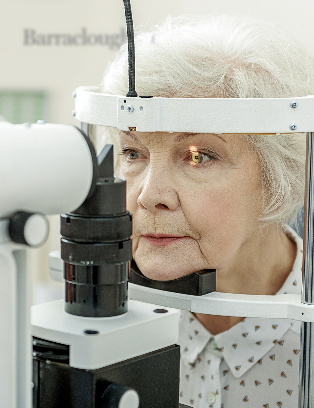 Senior lady having an eye exam