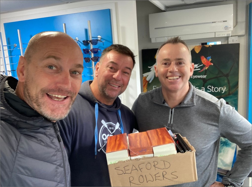 Managing Director Jeremy Heynes, with two of the Seaford Rowers!